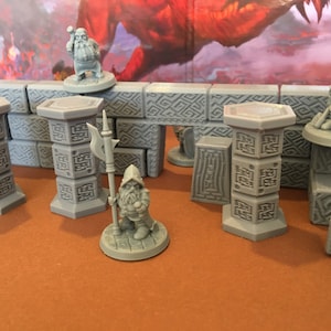 May include: A set of gray 3D printed miniature dungeon tiles with a gray dwarf miniature holding a spear and a gray dwarf miniature holding a hammer. The tiles feature a repeating geometric pattern.
