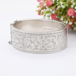 Vintage Sterling Silver Engraved Bangle Bracelet 1959 by Joseph Gloster - Chunky Victorian Aesthetic Scrolling Style with Safety Chain