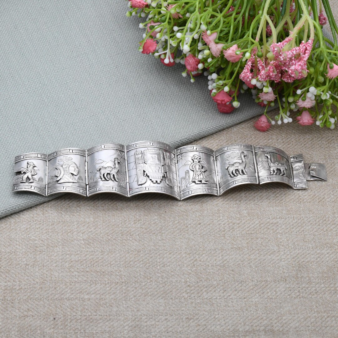 Vintage Peruvian Sterling Silver Bracelet Engraved Relief Panels