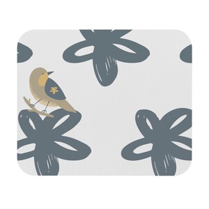 May include: A light gray background with a repeating pattern of blue stylized flowers. A small brown bird with a yellow breast is perched on a branch in the center of the image.