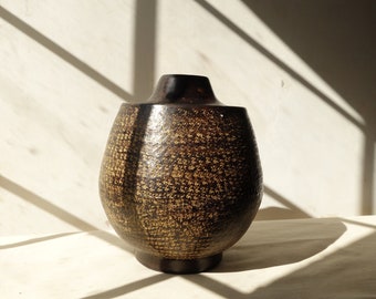 Moroccan Hammered Iron Vase.