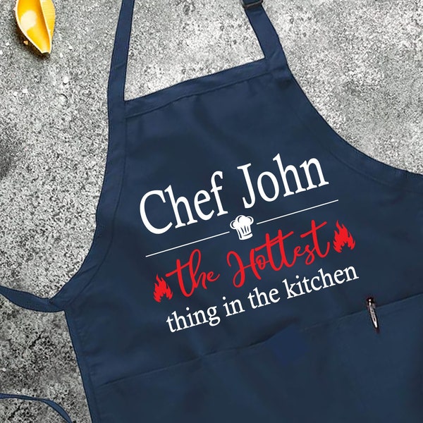 Personalized The Hottest Thing In The Kitchen Apron, Adjustable Neck, Funny Apron, Custom Name Cooking Apron with Pockets, BBQ Cooking Apron