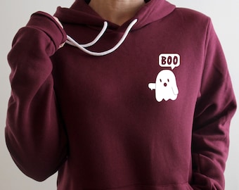 May include: A maroon hoodie with a white ghost graphic and the word "BOO" in a speech bubble.
