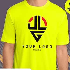May include: Neon yellow t-shirt with a custom logo design. The logo is black and red, with the text "YOUR LOGO HERE" below it. The shirt also features the text "CUSTOM TEXT - LOGO - IMAGE" in a white rectangle.