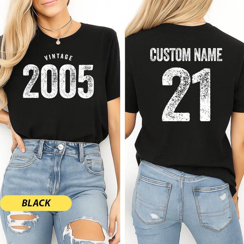 A woman wearing a black t-shirt with the text "VINTAGE 2005" printed on it, and the number "21" printed below. She is also wearing distressed jeans.