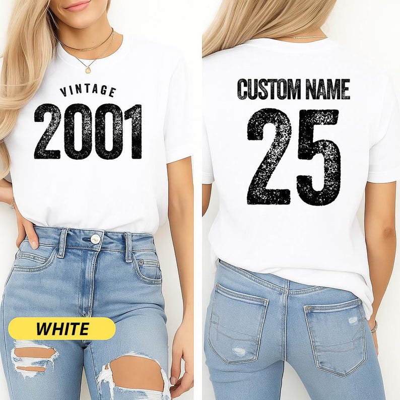 A woman wearing a white t-shirt with the text "VINTAGE 2001" printed on it, along with the number "25" printed below. She is also wearing distressed jeans.