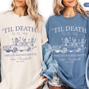 two women wearing t-shirts with a graphic design related to a bachelorette party.