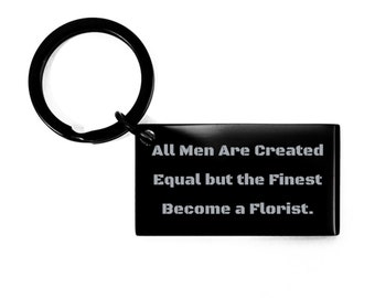 May include: Black metal keychain with a silver inscription that reads "All Men Are Created Equal but the Finest Become a Florist."