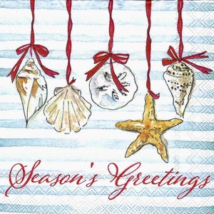 May include: A blue and white striped background with red ribbon and seashells hanging from it. The seashells are a scallop, a conch shell, and a sand dollar. A starfish is also hanging from the ribbon. The text "Season's Greetings" is written in red at the bottom of the image.