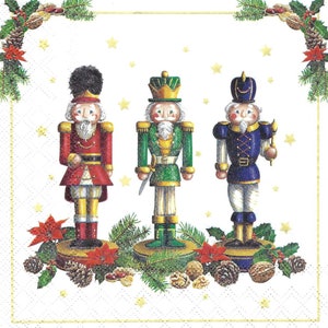 May include: A decorative image featuring three toy nutcrackers in red, green, and blue uniforms. The nutcrackers stand on circular bases, surrounded by festive greenery, poinsettias, pine cones, and stars, evoking a holiday theme.