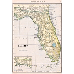 May include: A vintage map of Florida, featuring detailed geographical information. The map includes the Gulf of Mexico, the Atlantic Ocean, and the state's major cities and landmarks. The map is from the "Atlas of the World."