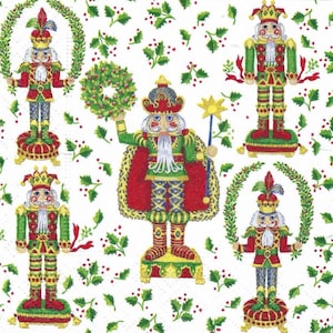 May include: A white background with a repeating pattern of green holly leaves and red berries. Five nutcracker figurines are featured in the design. Each nutcracker is wearing a different colored hat and outfit. The nutcrackers are standing on a base with a gold crown.