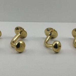 Set of Handcrafted Unlacquered Brass Hooks For Wall