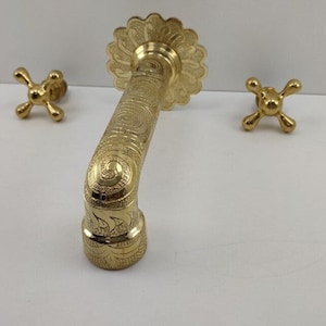 Wall-mounted brass faucet with brass handles for bathroom and kitchen; Unlacquered Brass Engraved Wall Mounted Bathroom Sink Faucet