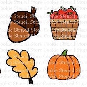 May include: A set of eight cookie cutters in various autumnal shapes, including a pumpkin, acorn, leaf, turkey, pie, and a basket of apples. The cutters are outlined in black and filled with orange, brown, and yellow colors.