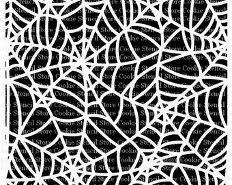 Puede incluir: Una imagen en blanco y negro de un patrón de telaraña. La telaraña está formada por muchas líneas finas que se cruzan para crear un diseño complejo.