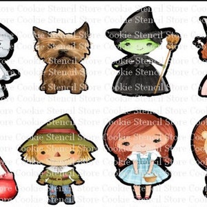 May include: A set of seven cookie cutters featuring characters from the Wizard of Oz. The cutters are in the shape of Dorothy, the Scarecrow, the Tin Man, the Cowardly Lion, the Wicked Witch of the West, Toto the dog, and the ruby slippers.
