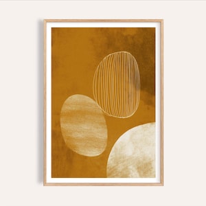 May include: Abstract art print in a wooden frame. The artwork features three organic shapes in white and off-white against a mustard yellow background. One shape is filled with vertical lines. The print has a modern, minimalist aesthetic.