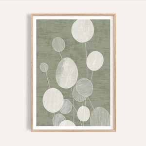 May include: Abstract botanical art print in a wooden frame. The artwork features white, circular shapes with textured, linear details on a muted green background. The design evokes a sense of calm and natural beauty, suitable for home decor.