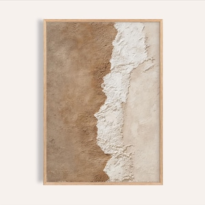 以下が含まれることがあります： 木製フレームに入った抽象的なウォールアート。アートワークは、茶色、ベージュ、白のカラーパレットでテクスチャードデザインを特徴としています。デザインは、視覚的なコントラストを生み出す垂直方向の分割で、粗く、不均一なテクスチャを持っています。
