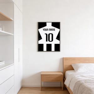 Minimalist soccer jersey print with bold numerals and clean back layout, perfect match day decor for football fans and kids bedrooms