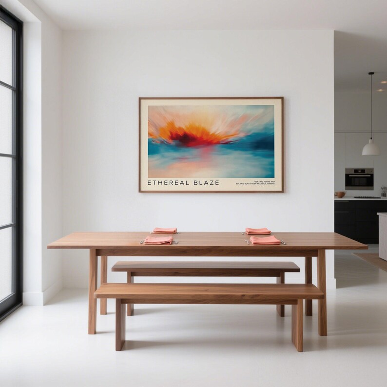Modern abstract wall art featuring a fiery sunrise over water.