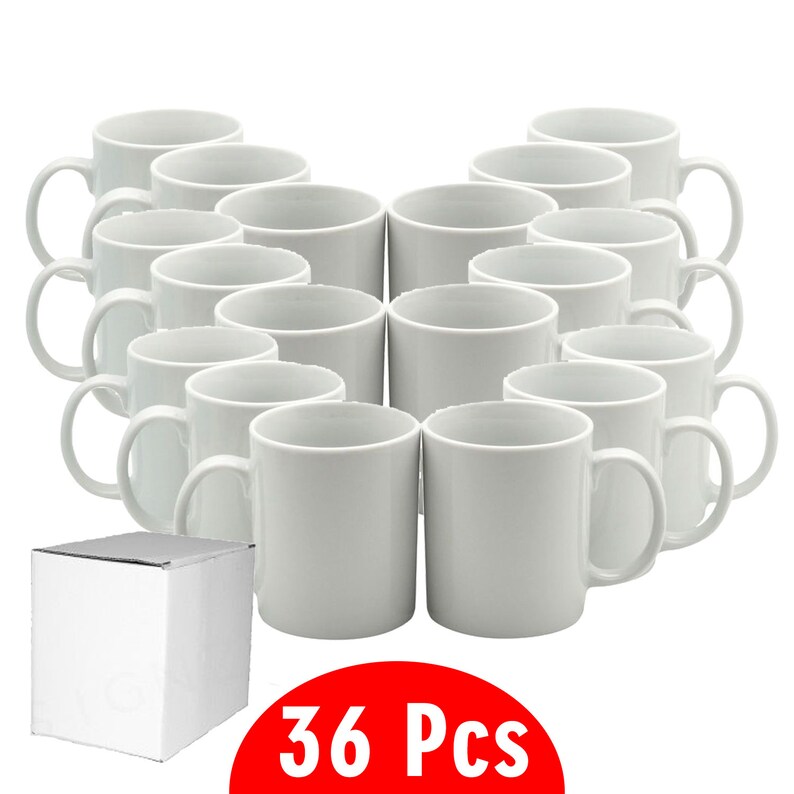 May include: A collection of 36 white ceramic mugs, each with a curved handle. The mugs are arranged in rows, with a white box in the lower left corner. The number "36 Pcs" is displayed in a red circle at the bottom.