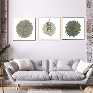 K&ouml;nnte beinhalten: Drei gerahmte Drucke mit minimalistischem Design, die Linienzeichnungen verschiedener Blattarten in Gr&uuml;nt&ouml;nen auf wei&szlig;em Hintergrund zeigen.