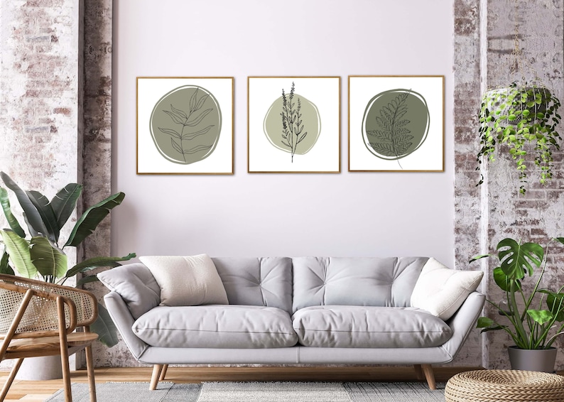 K&ouml;nnte beinhalten: Drei gerahmte Drucke mit minimalistischem Design, die Linienzeichnungen verschiedener Blattarten in Gr&uuml;nt&ouml;nen auf wei&szlig;em Hintergrund zeigen.
