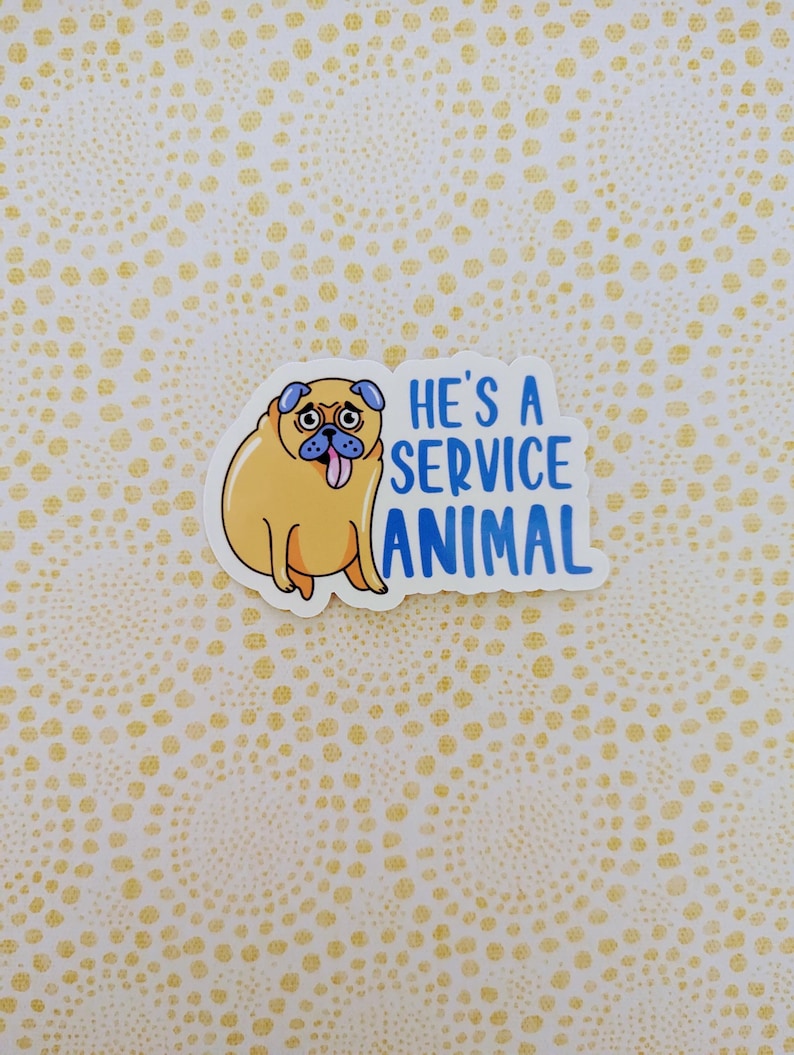 May include: A sticker featuring a cartoon pug with the text "He's a service animal" in blue letters.