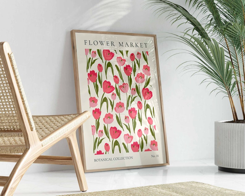 May include: A framed print featuring a floral design with pink and green tulips. The print is titled "Flower Market" and is part of a "Botanical Collection".
