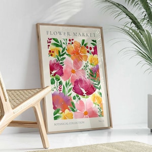 May include: A framed watercolor print of a floral arrangement featuring pink, red, yellow, and purple flowers with green leaves. The print is titled "FLOWER MARKET" and "BOTANICAL COLLECTION" with the number "No. 21" at the bottom right corner.