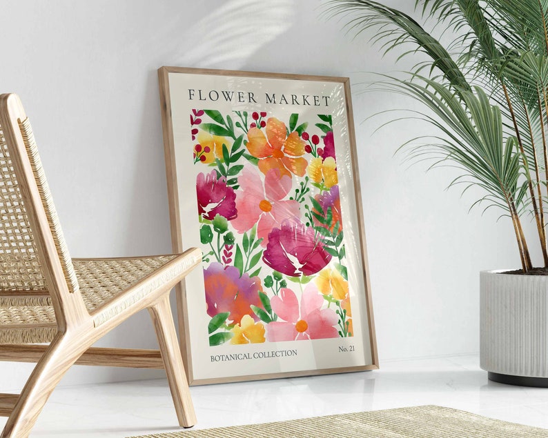 May include: A framed watercolor print of a floral arrangement featuring pink, red, yellow, and purple flowers with green leaves. The print is titled "FLOWER MARKET" and "BOTANICAL COLLECTION" with the number "No. 21" at the bottom right corner.