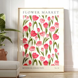 May include: A floral print poster featuring pink tulips and green leaves on a white background. The poster has the text "FLOWER MARKET" at the top and "BOTANICAL COLLECTION No. 14" at the bottom.