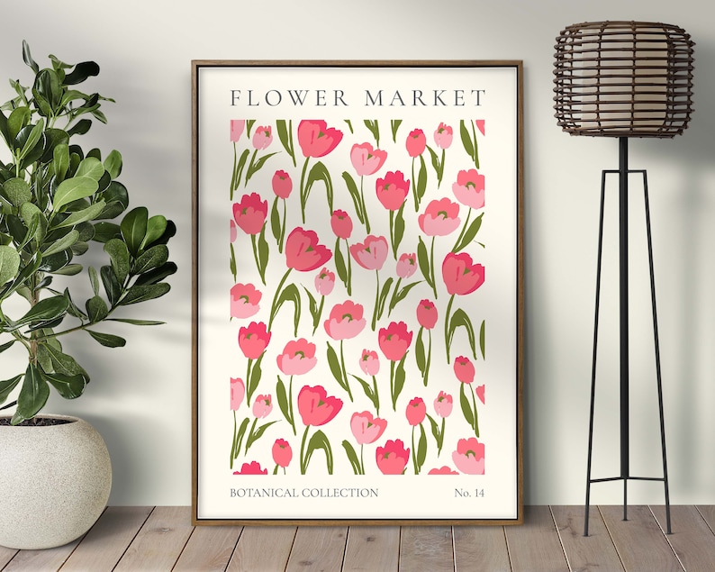 May include: A framed print featuring a white background with a repeating pattern of pink tulips and green leaves. The print is titled "FLOWER MARKET" at the top, with "BOTANICAL COLLECTION" at the bottom left and "No. 14" at the bottom right.
