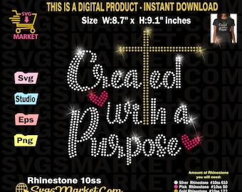 May include: A rhinestone design with the words "Created within a purpose" and a cross. The design is approximately 8.7 inches wide and 9.1 inches tall. The design is made with silver, pink, and gold rhinestones.