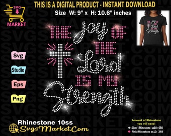 Puede incluir: Diseño de pedrería para una camiseta que dice "The Joy of the Lord is My Strength" con una cruz y pedrería rosa. El diseño mide 22,9 cm de ancho y 26,9 cm de alto.
