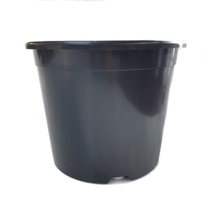 May include: A black plastic plant pot with a round shape and a slightly flared rim. The pot has a smooth surface and a flat base with three small feet.