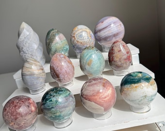 Esfera, huevo y llama de jaspe marino