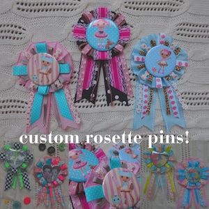 May include: A collection of custom rosette pins featuring circular centers with cartoon character illustrations, surrounded by layered ribbons in various colors, patterns, and textures, including lace, polka dots, and stripes, with hanging tails.