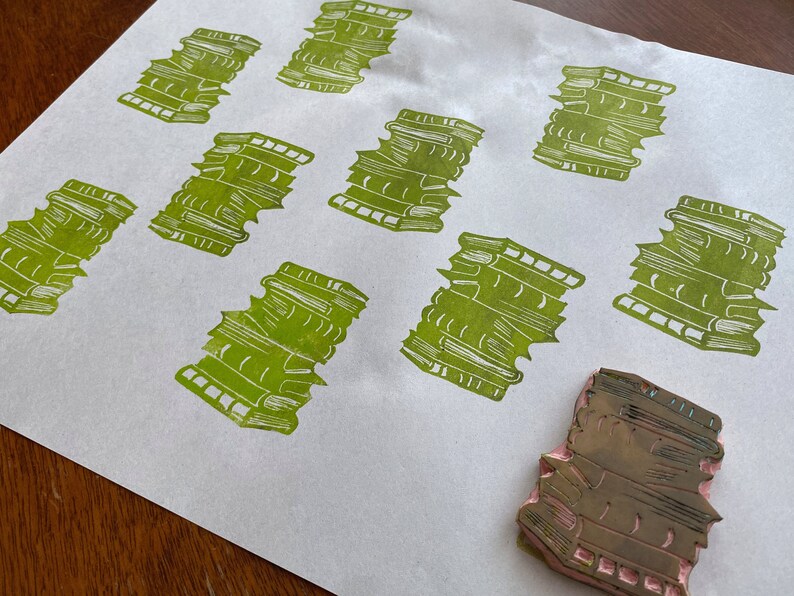 Stamps on newsprint make for eco friendly gift wrap.