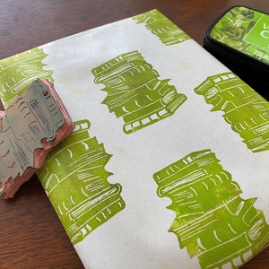 Have a book lover in your life?  Gift them this stamp or a book and make your own gift wrap.