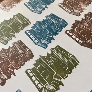 Repeating pattern made with the book lover's stamp.