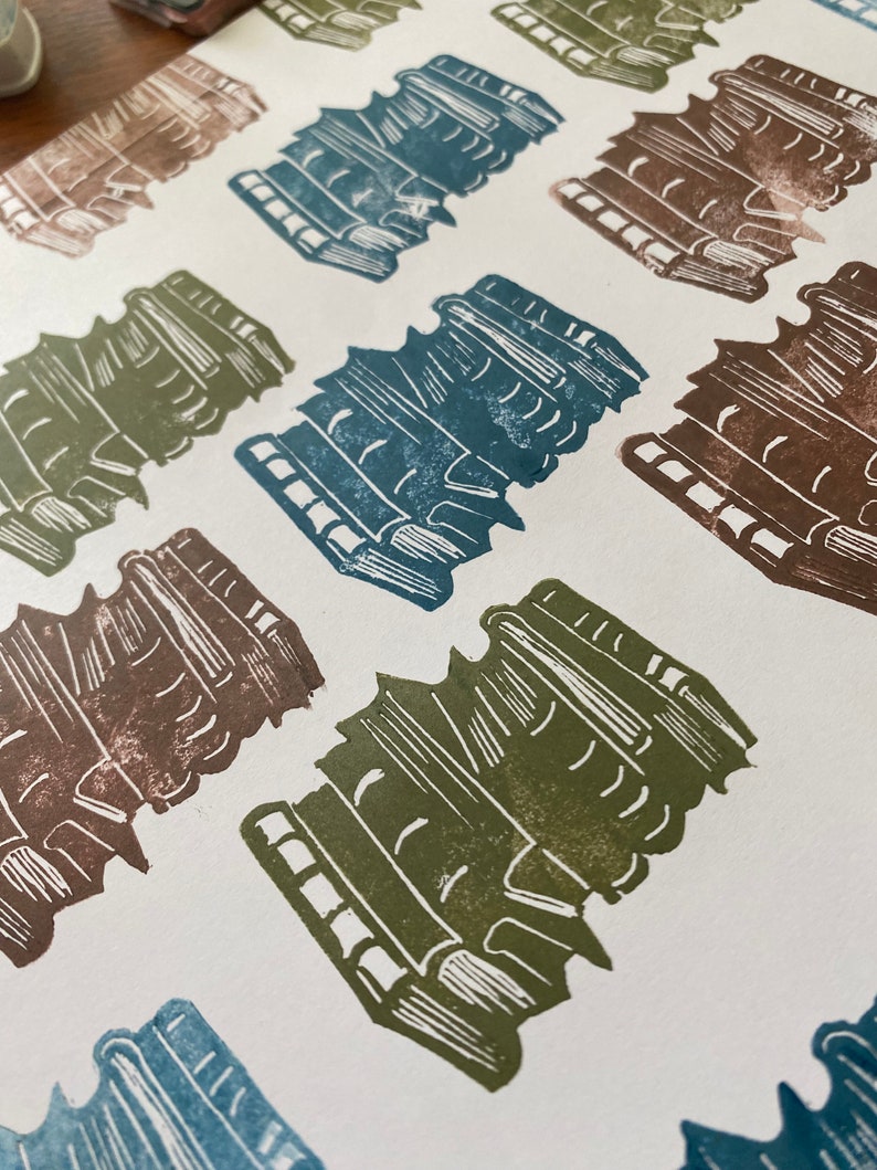 Repeating pattern made with the book lover's stamp.