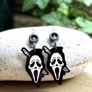 Ghost Face Earrings with Knife Through Head – Silver Circle Bead Dangle Earrings – Horror Movie Jewelry – Halloween Accessories