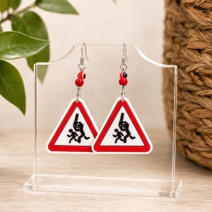 Chainsaw Chase Earrings – Hilarious Triangle Warning Sign Jewelry for Horror Lovers
