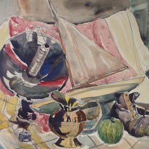 May include: A watercolor painting depicting a still life arrangement featuring a dark electric fan, a model sailboat, a metallic pitcher, a green fruit, and a dark shoe, all resting on a patterned fabric with red, white, and yellow tones.