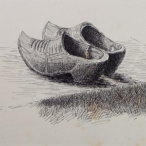 May include: Pen and ink illustration of a pair of wooden clogs. The clogs are depicted in a side view, with detailed shading to show the texture of the wood. The image is a study in black and white, with cross-hatching used to create depth and shadow.