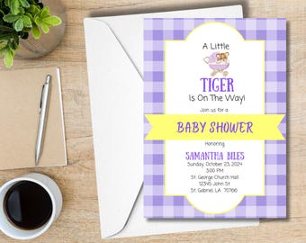May include: A purple and yellow baby shower invitation with a gingham pattern. The invitation reads "A Little Tiger Is On The Way!" and includes the name Samantha Biles, the date and time of the shower, and the location.