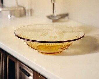 Fruit bowl with cherry pattern brown glass.